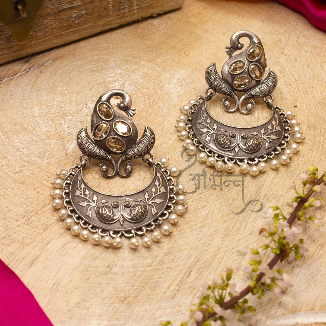 Silver lookalike Peacock Design Studs With Yellow Stones Studded Earrings for Women