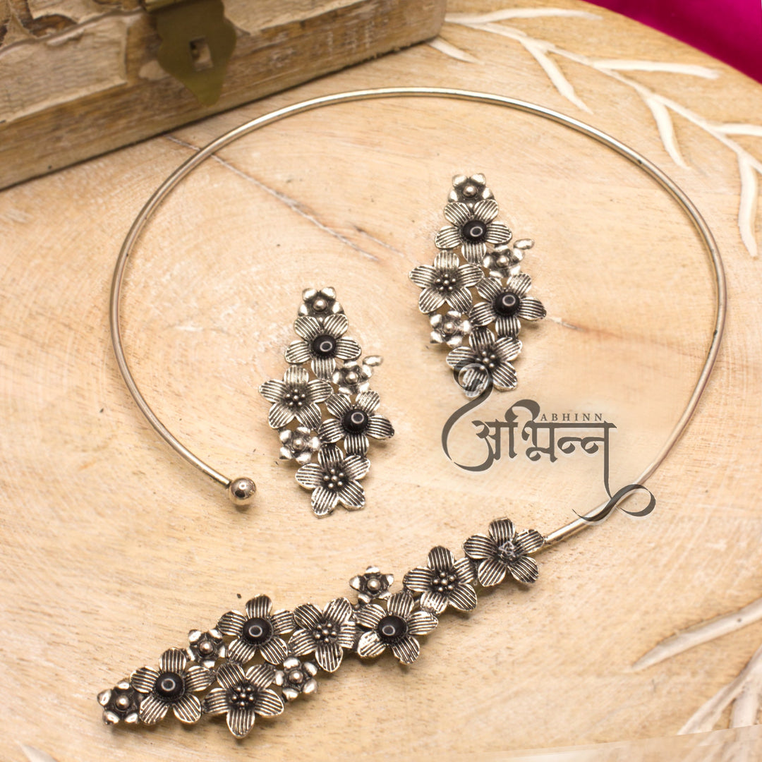 Abhinn Silver Oxidised Black Floral Design Hasli Necklace Set For Women