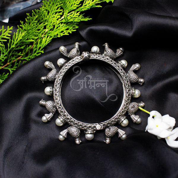Abhinn Unique Silver Replica Bracelet Studded With Pigeon And White Pearl For Girls